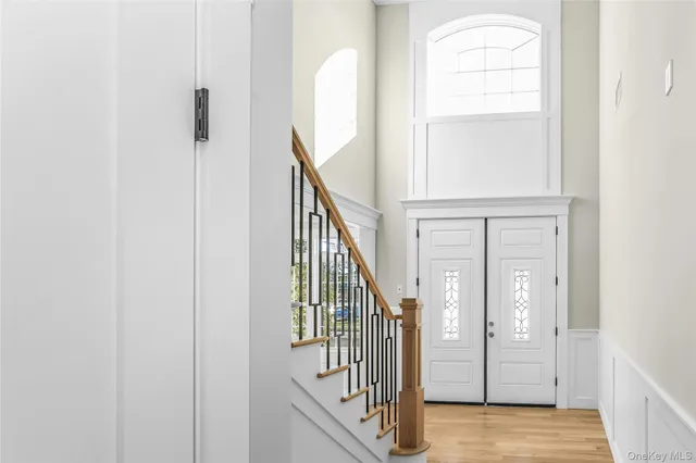 a view of front door with stairs