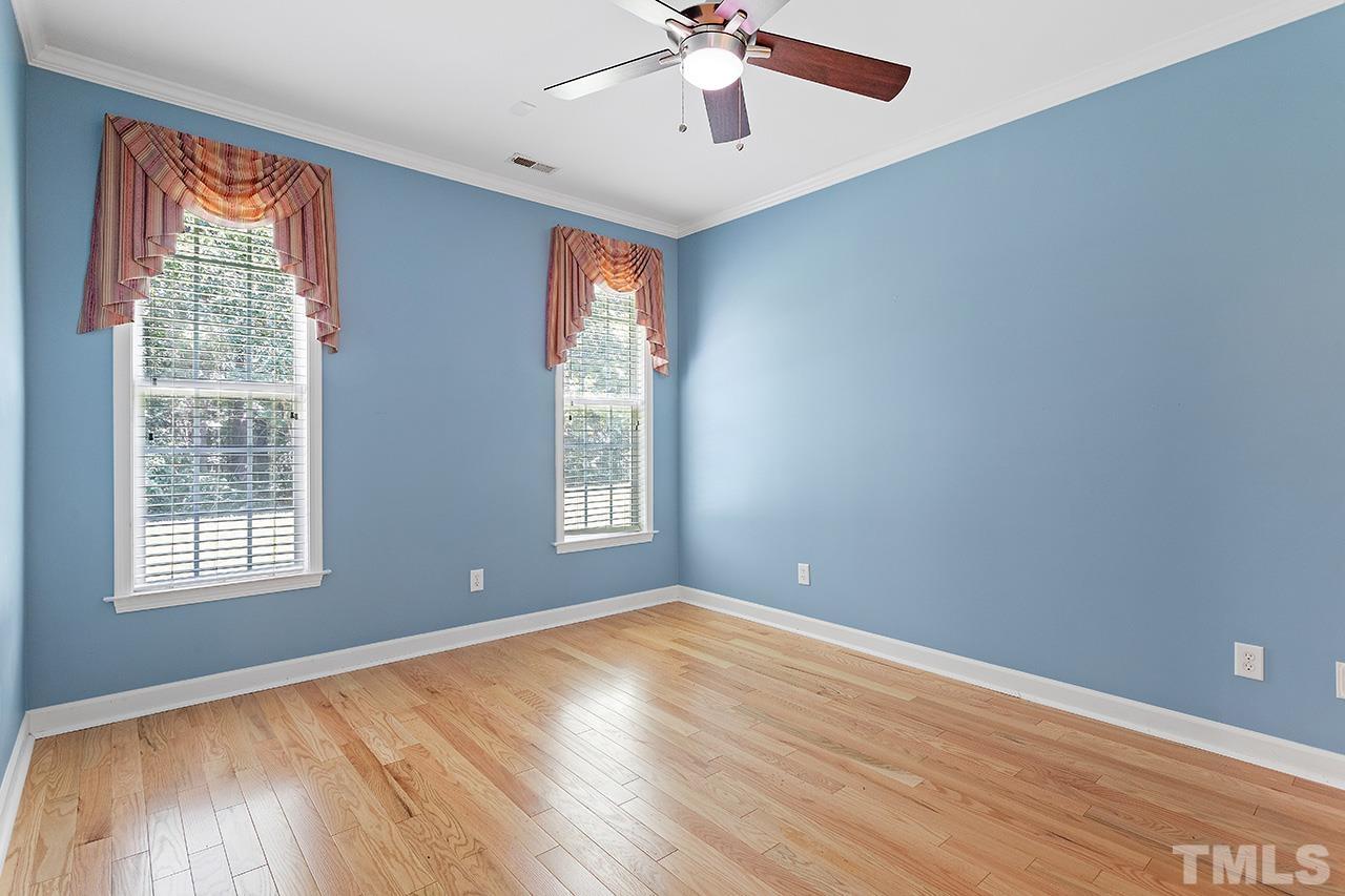 844 Horton Road, Unit 64 Durham, NC 27704 - Photo 14 of 25 wooden floor in an empty room with a window