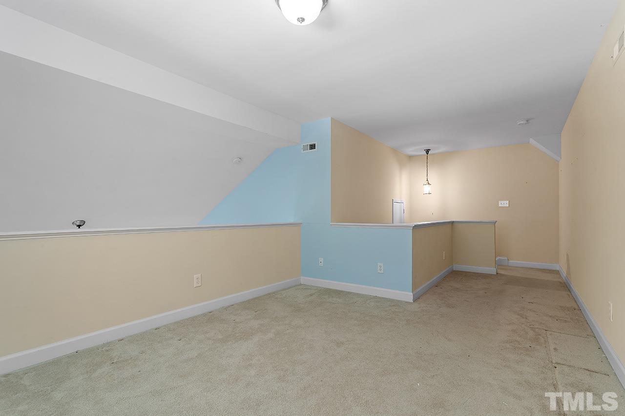 844 Horton Road, Unit 64 Durham, NC 27704 - Photo 21 of 25 a view of an empty room
