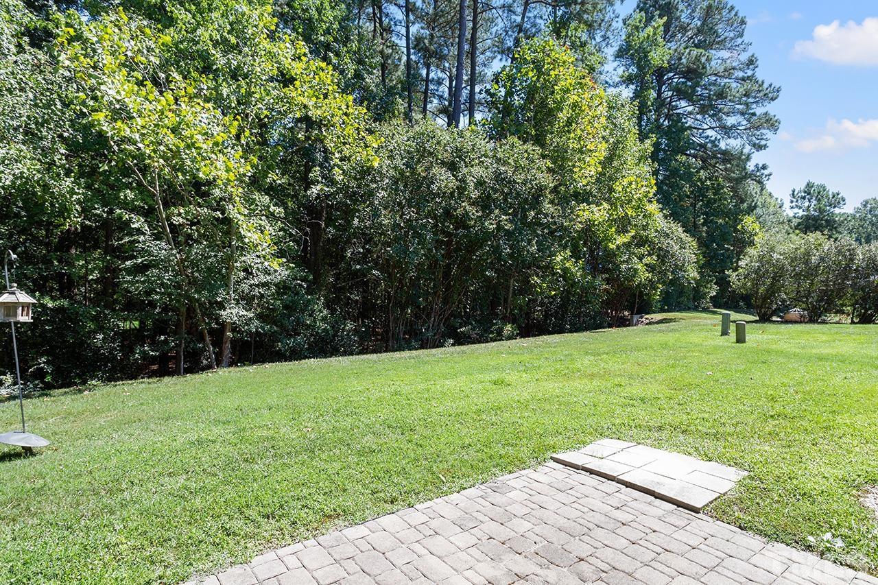 844 Horton Road, Unit 64 Durham, NC 27704 - Photo 25 of 25 a view of a garden with a tree