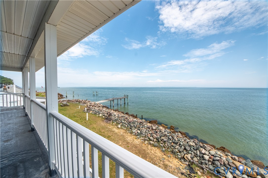 154 Riverside Drive Deltaville, VA 23043 - Photo 28 of 38 a view of ocean from a balcony
