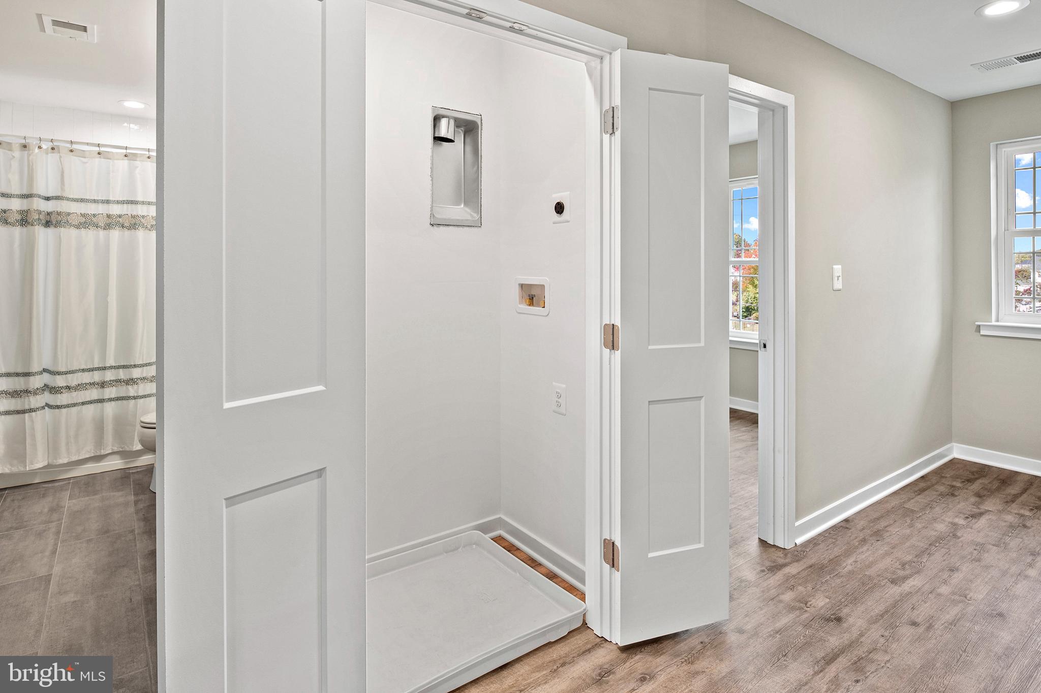 7309 Geise Avenue Sparrows Point, MD 21219 - Photo 25 of 48 Upper Level Hallway and Washer Drier Closet
