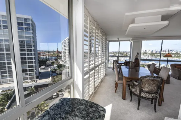 a view of a dining room with furniture window and outside view