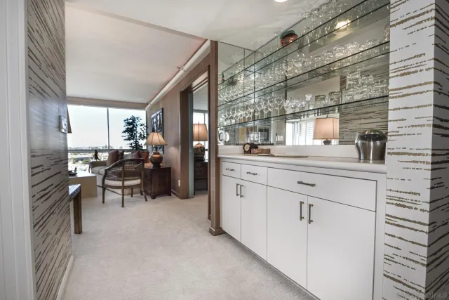 a kitchen with sink cabinets and window
