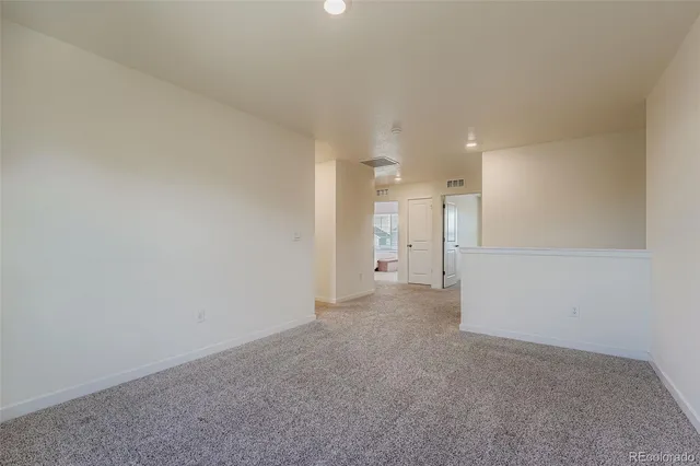 a view of a big room with a hallway