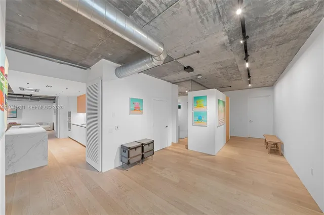 a view of a livingroom with a furniture