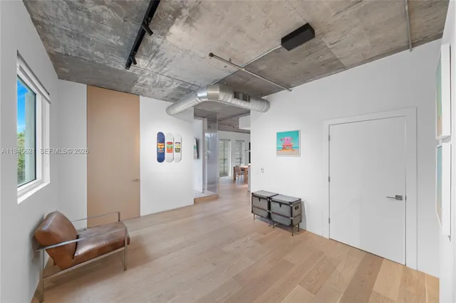 a view of livingroom with furniture and windows
