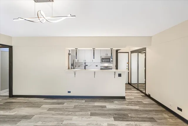 a utility room with cabinets