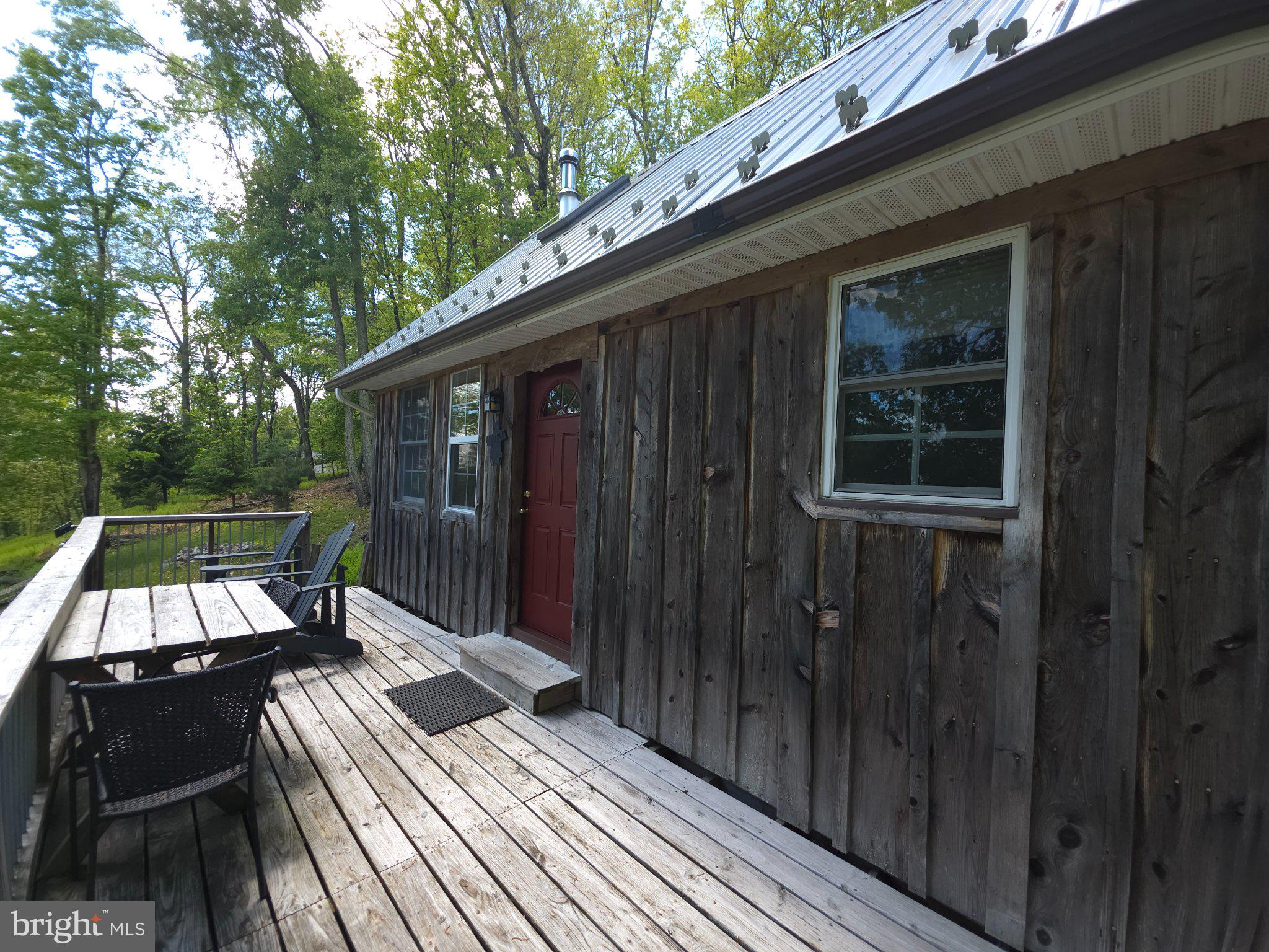 152 Sharp Ridge Lane Franklin, WV 26807 - Photo 4 of 53 a view of balcony with wooden floor