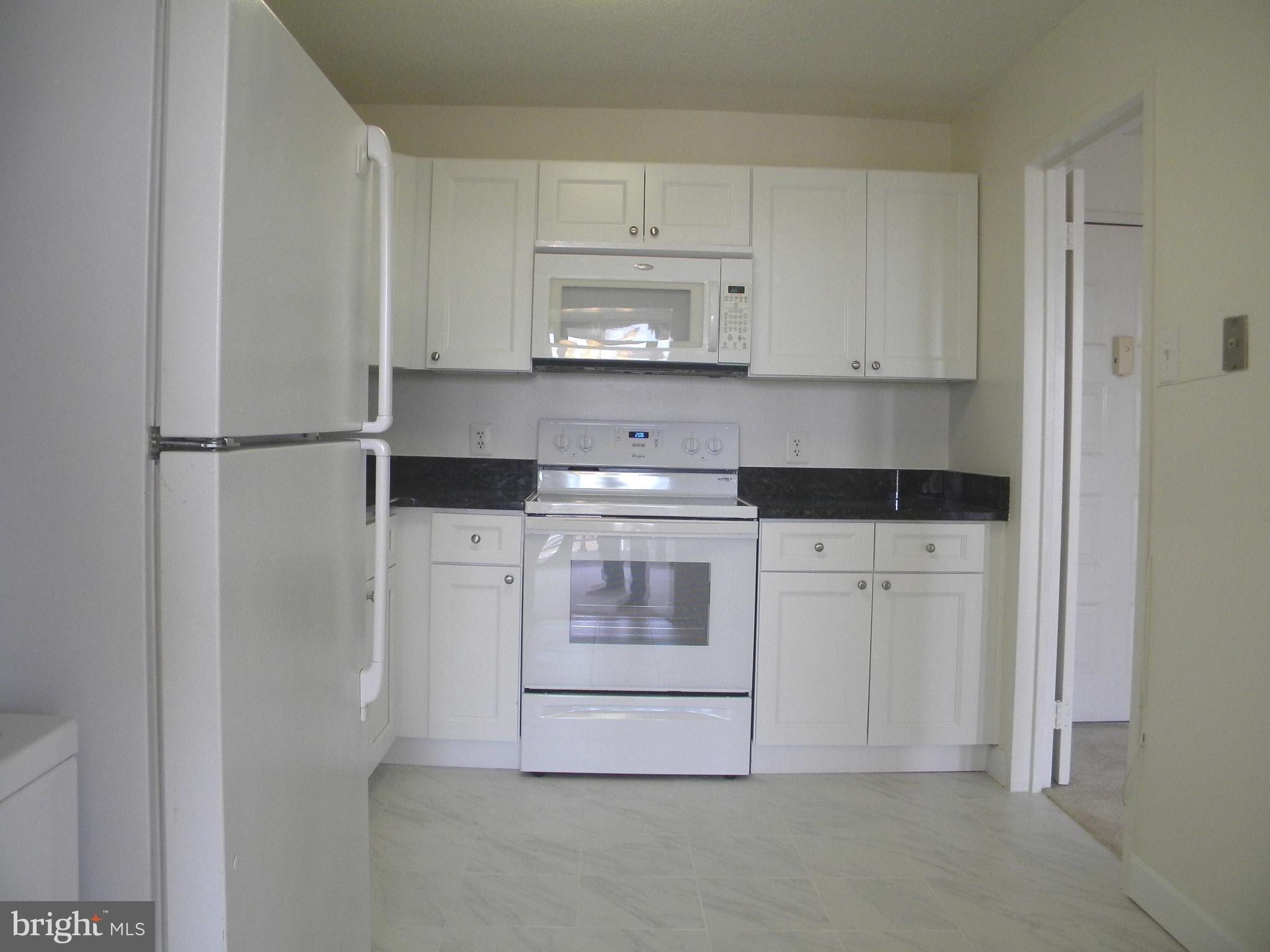 6800 Fleetwood Road, Unit 421 McLean, VA 22101 - Photo 12 of 24 Kitchen as seen from Dining Room