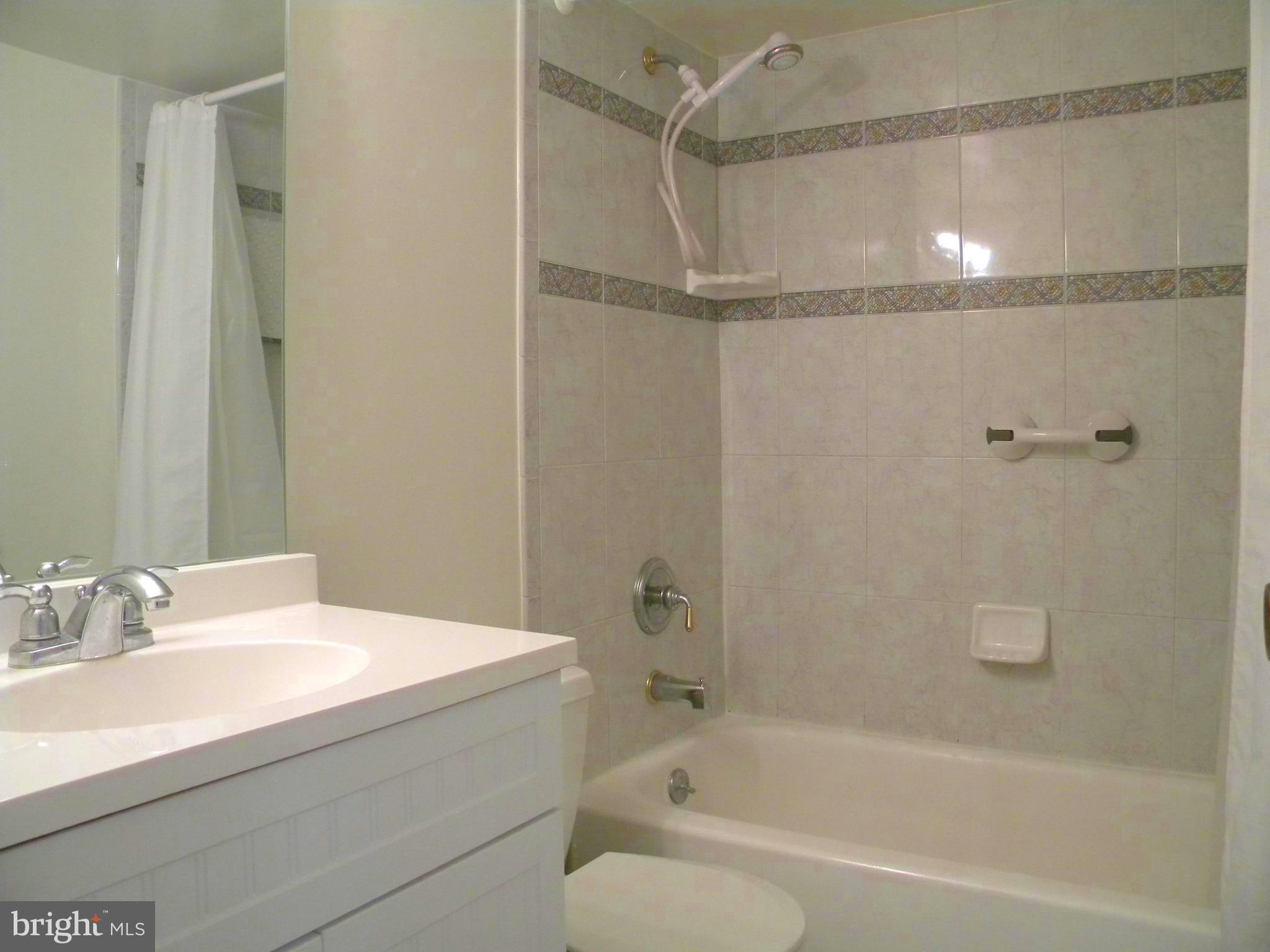6800 Fleetwood Road, Unit 421 McLean, VA 22101 - Photo 14 of 24 Bath (Master) with new tile and fixtures