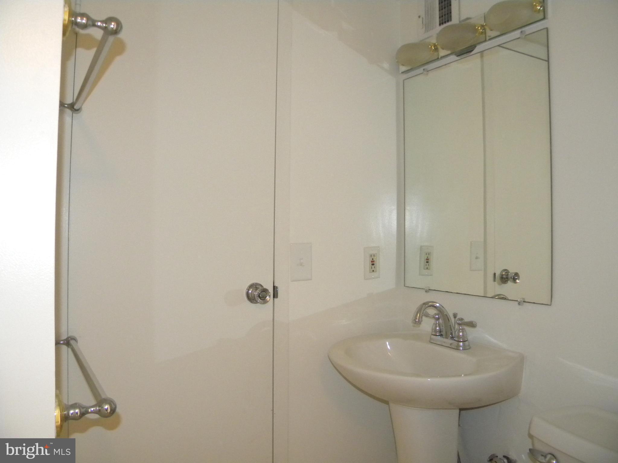 6800 Fleetwood Road, Unit 421 McLean, VA 22101 - Photo 16 of 24 Half Bath accessible from Foyer and from LR