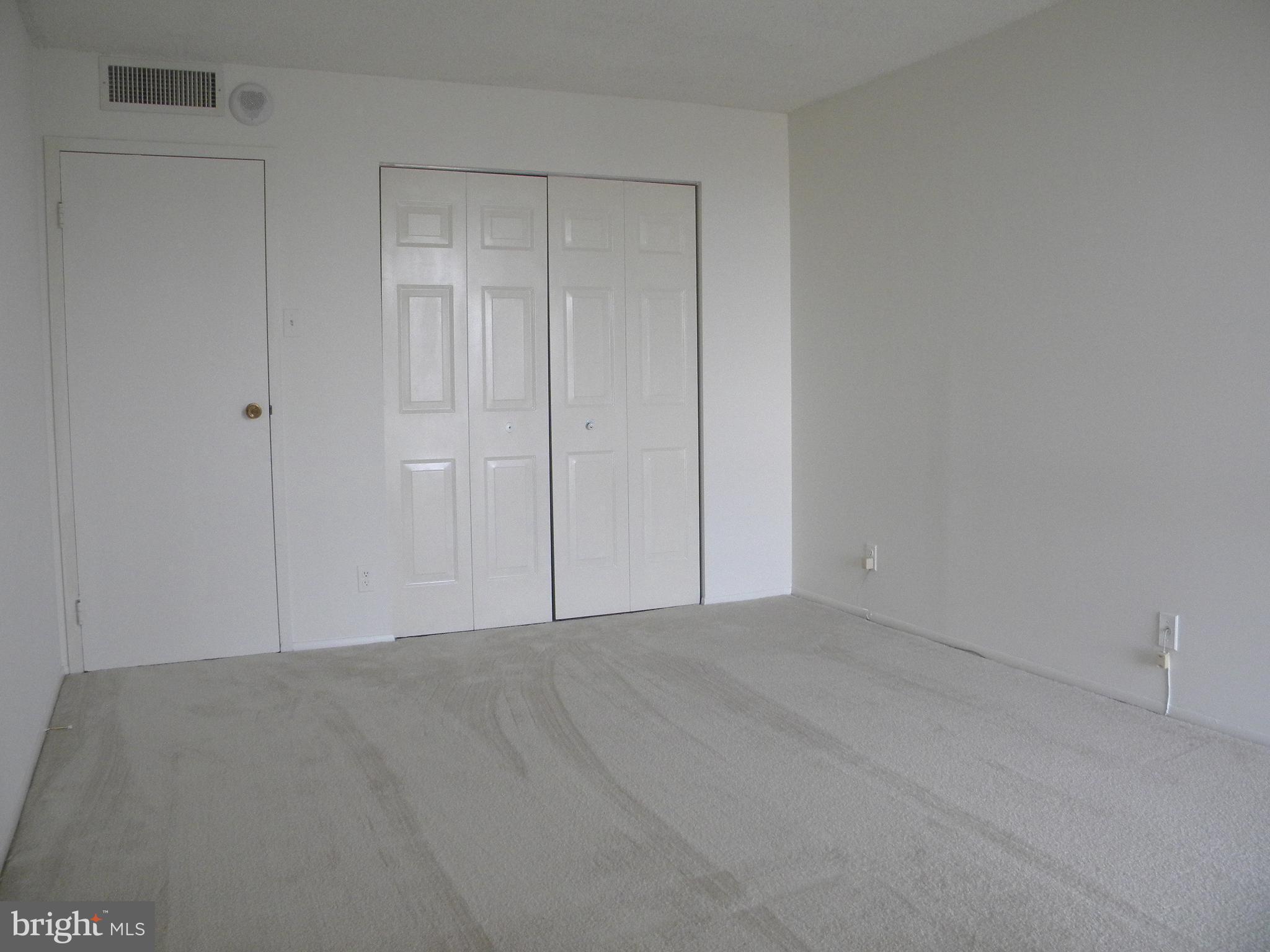 6800 Fleetwood Road, Unit 421 McLean, VA 22101 - Photo 17 of 24 Spacious and Bright Bedroom