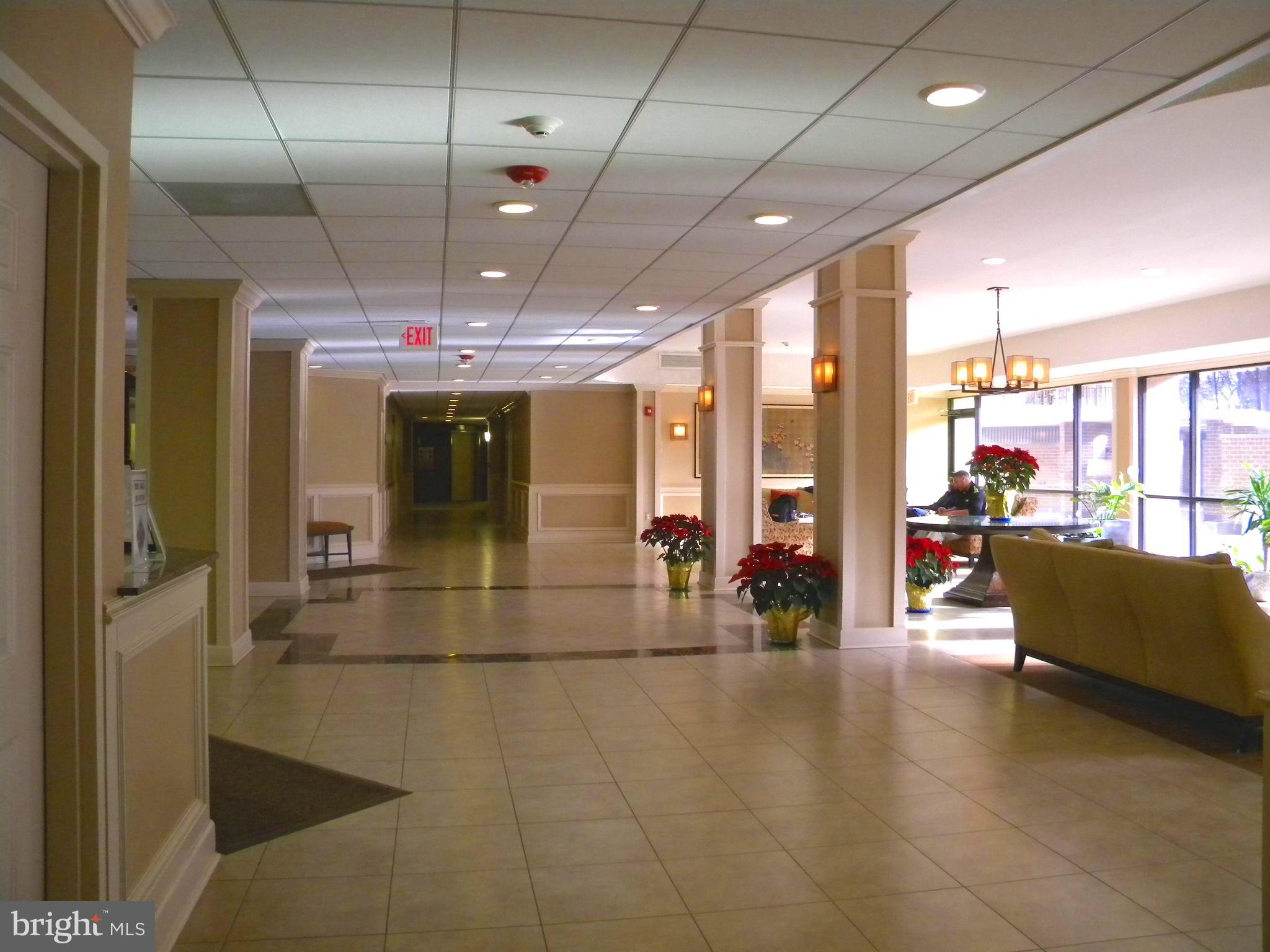 6800 Fleetwood Road, Unit 421 McLean, VA 22101 - Photo 21 of 24 Entrance Foyer , main desk, reception area