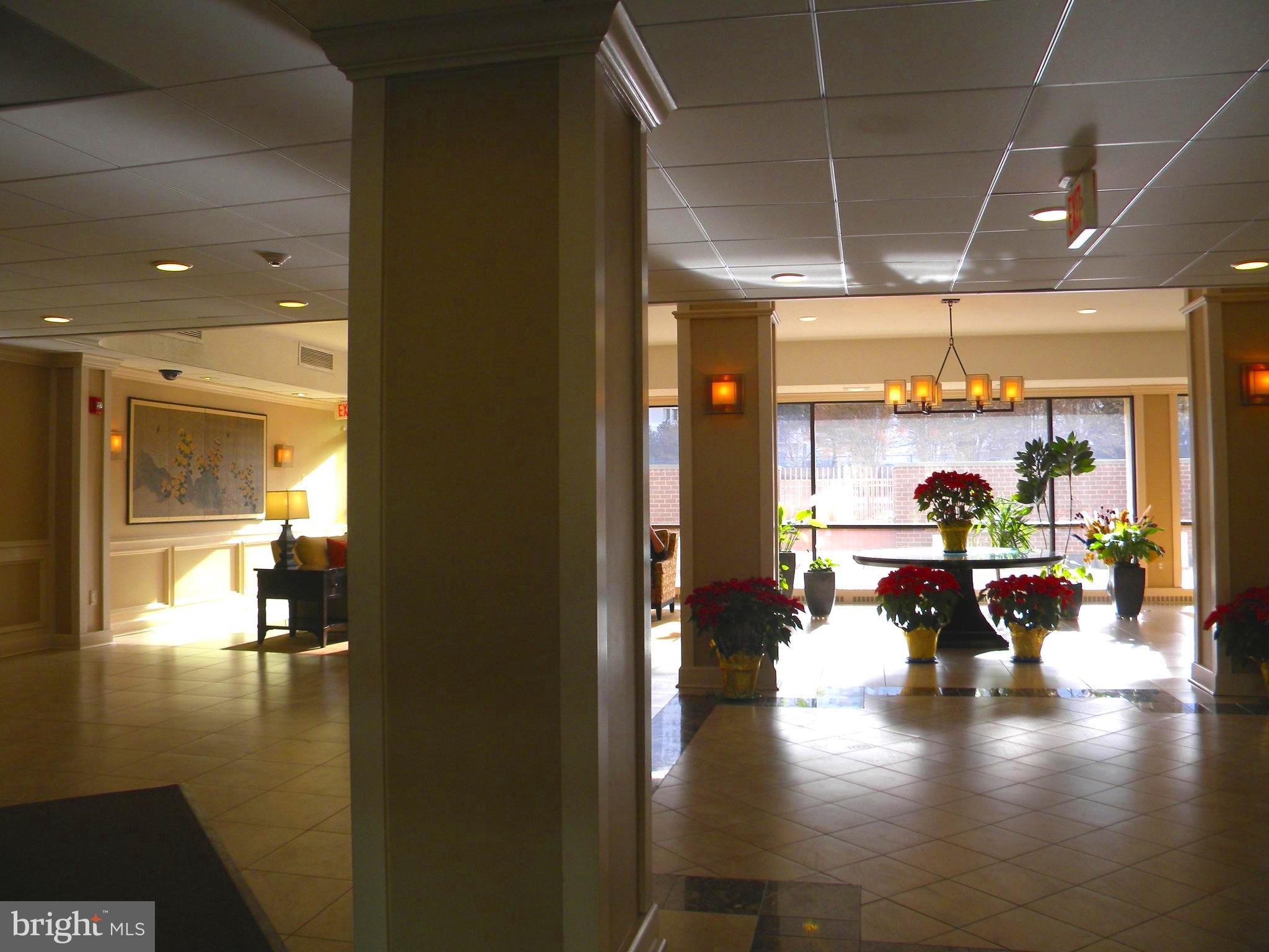 6800 Fleetwood Road, Unit 421 McLean, VA 22101 - Photo 22 of 24 Front Entrance showing Reception Area