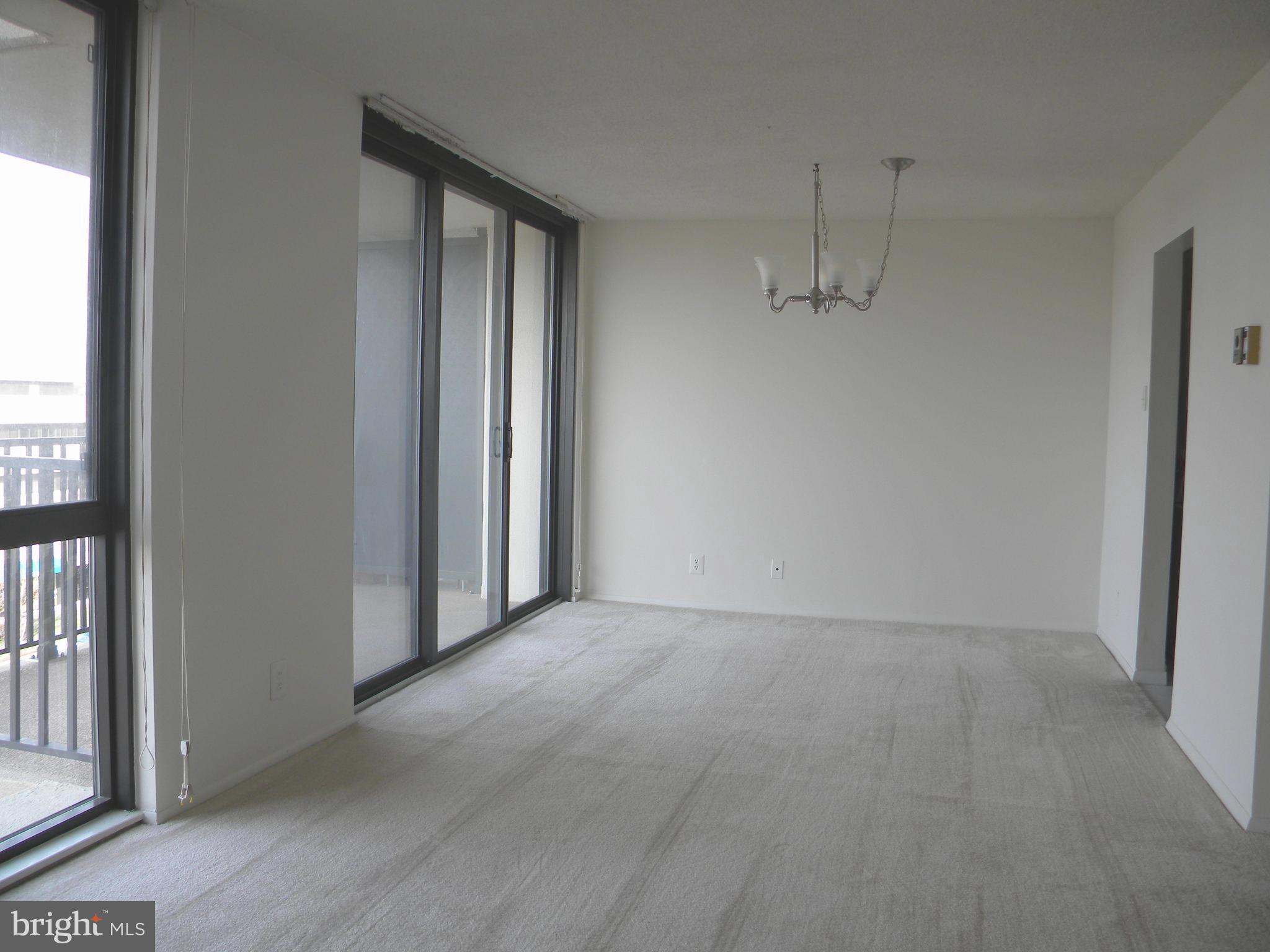 6800 Fleetwood Road, Unit 421 McLean, VA 22101 - Photo 8 of 24 Dining Room with Slider onto Balcony