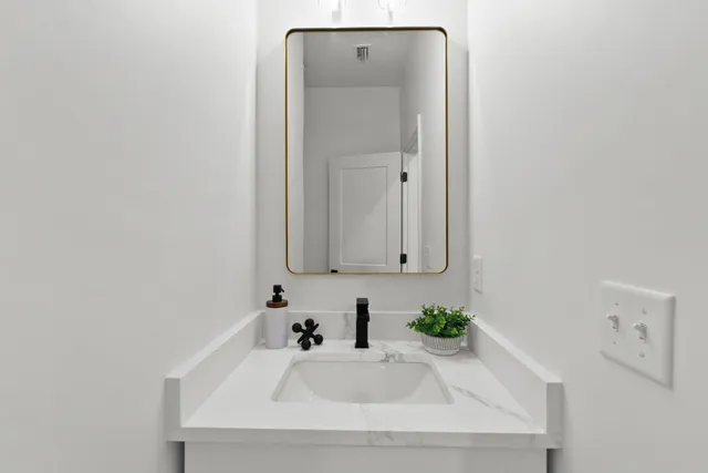 a bathroom with a sink and a bathtub