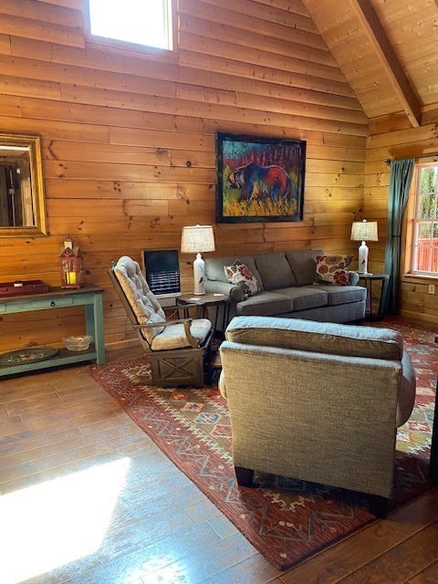 360 Johnson Cove Road Copperhill, TN 37317 - Photo 16 of 56 a living room with furniture and a rug