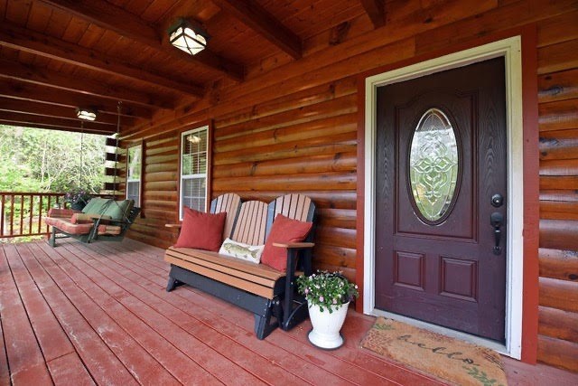 360 Johnson Cove Road Copperhill, TN 37317 - Photo 18 of 56 a view of sitting area with furniture and wooden floor