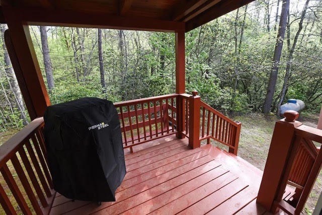 360 Johnson Cove Road Copperhill, TN 37317 - Photo 20 of 56 a view of balcony with wooden floor