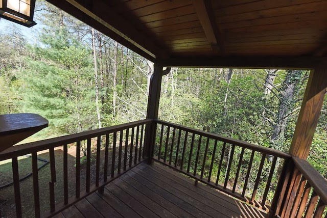 360 Johnson Cove Road Copperhill, TN 37317 - Photo 24 of 56 a view of balcony with wooden floor