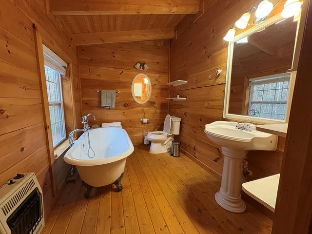 a room with furniture and a flat screen tv