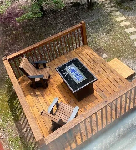 a view of a balcony with a swimming pool