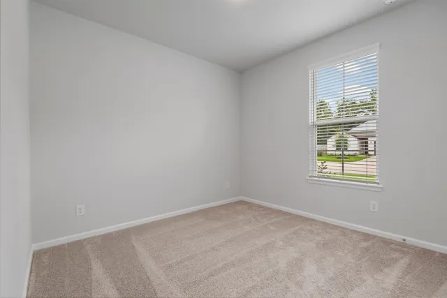 an empty room with a window