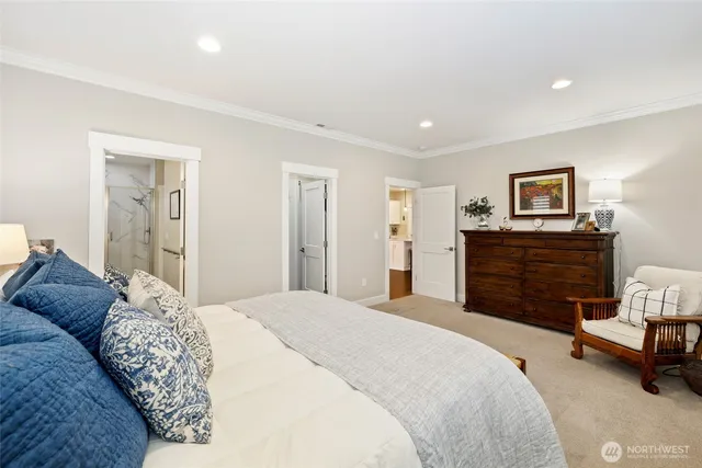 a bedroom with a bed and furniture