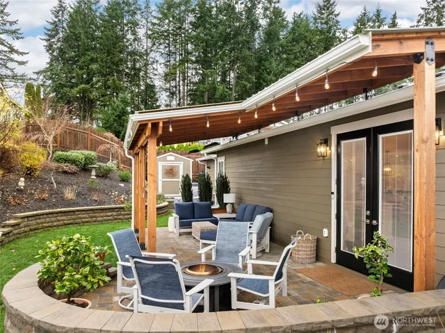 a patio with table and chairs