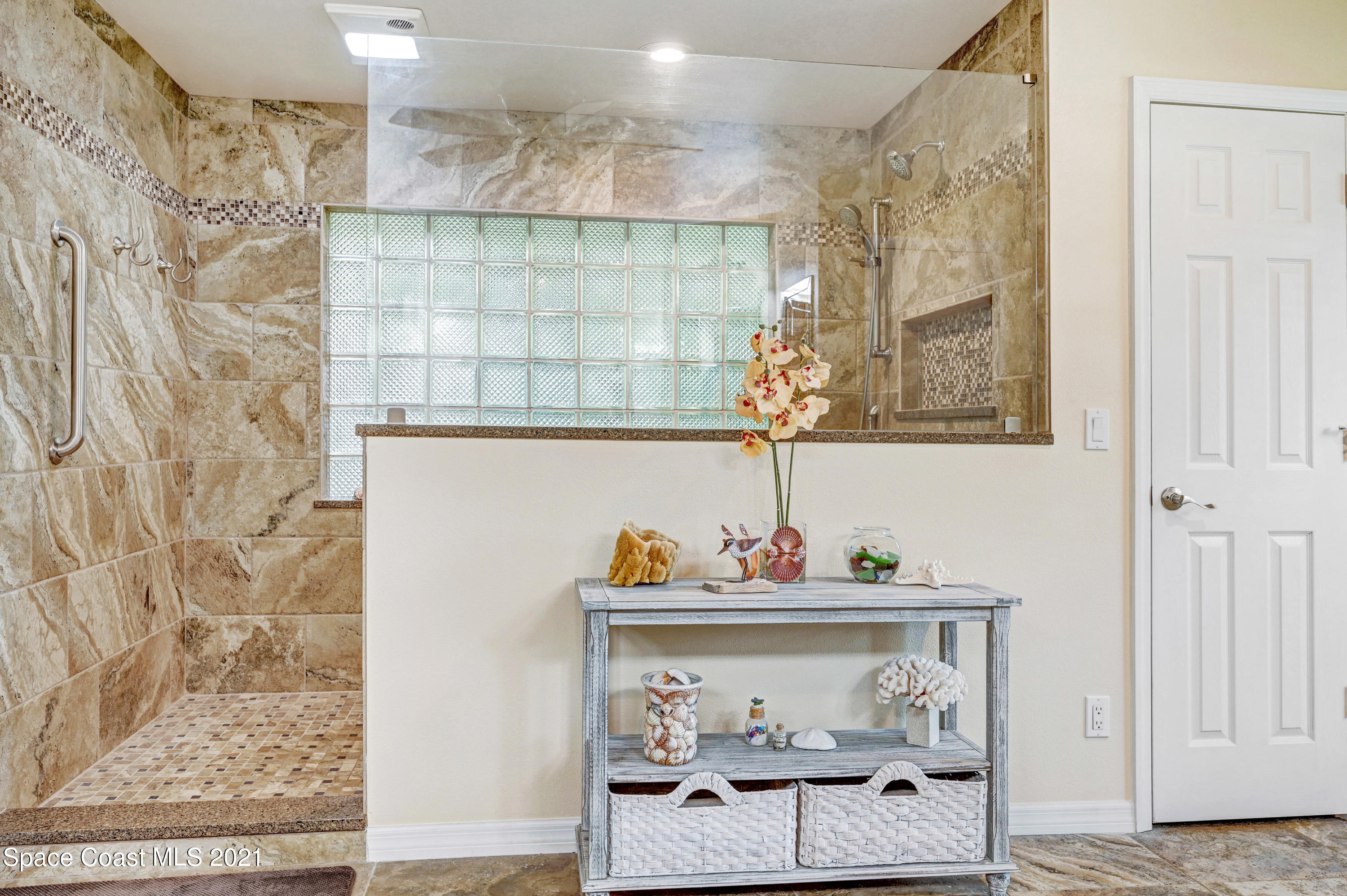 4689 Canard Road Melbourne, FL 32934 - Photo 14 of 49 a bathroom with a sink and a mirror