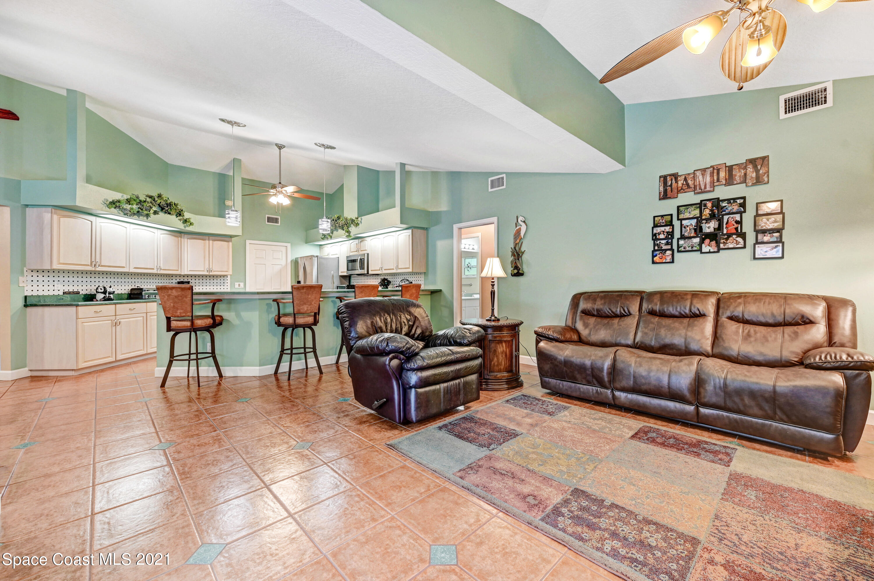4689 Canard Road Melbourne, FL 32934 - Photo 27 of 49 a living room with furniture