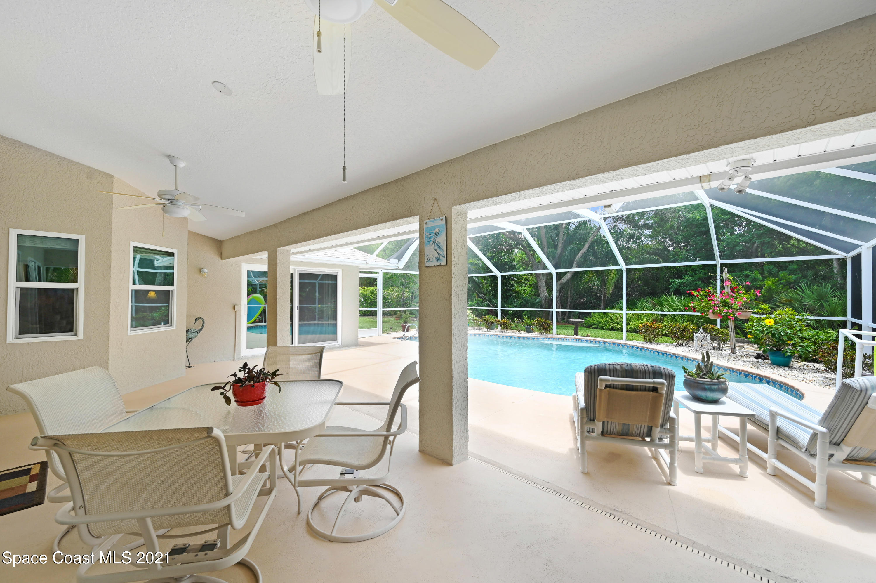 4689 Canard Road Melbourne, FL 32934 - Photo 32 of 49 a view of a dining room with furniture window and outside view