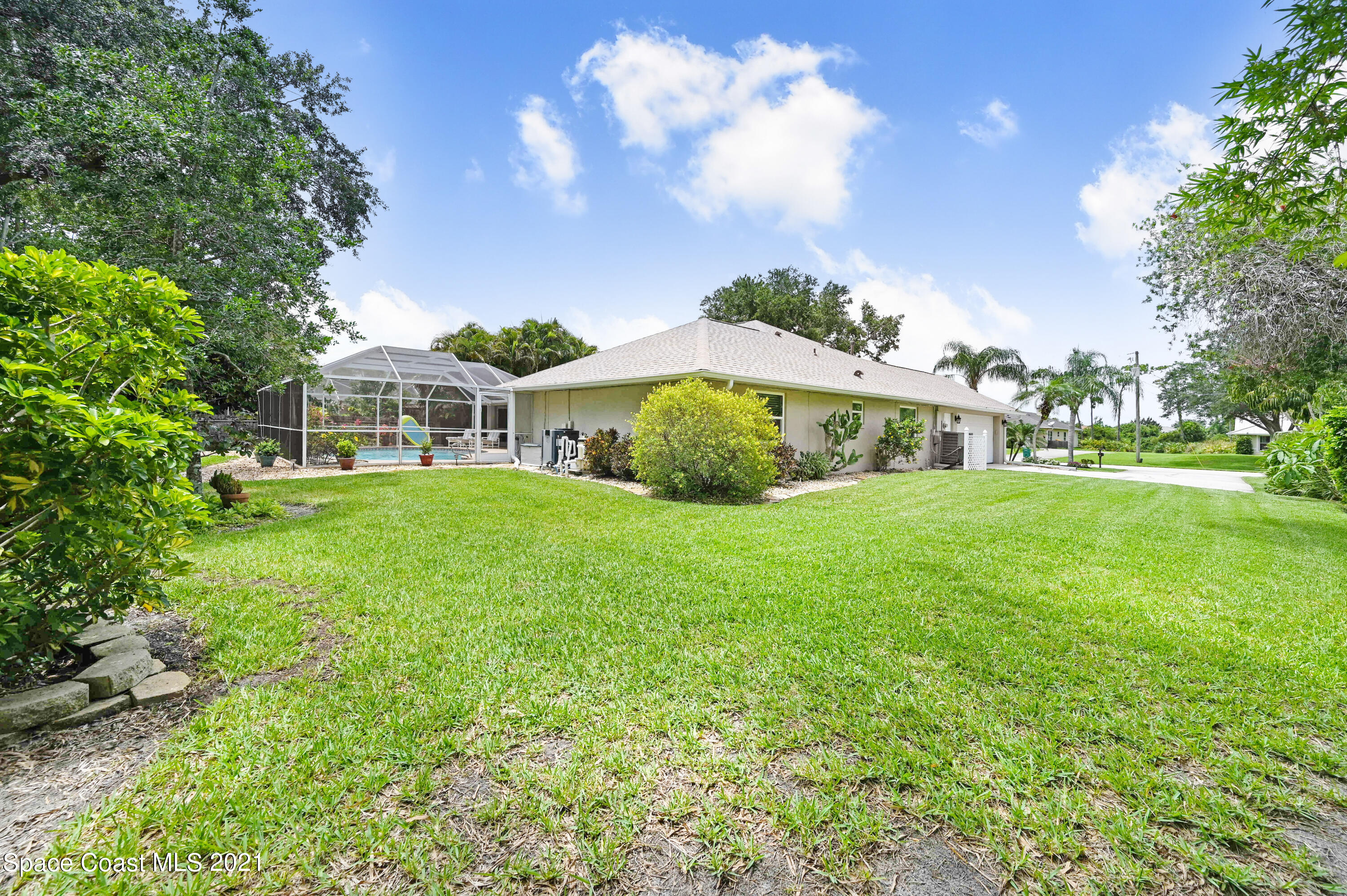 4689 Canard Road Melbourne, FL 32934 - Photo 40 of 49 a view of house with garden space and street view
