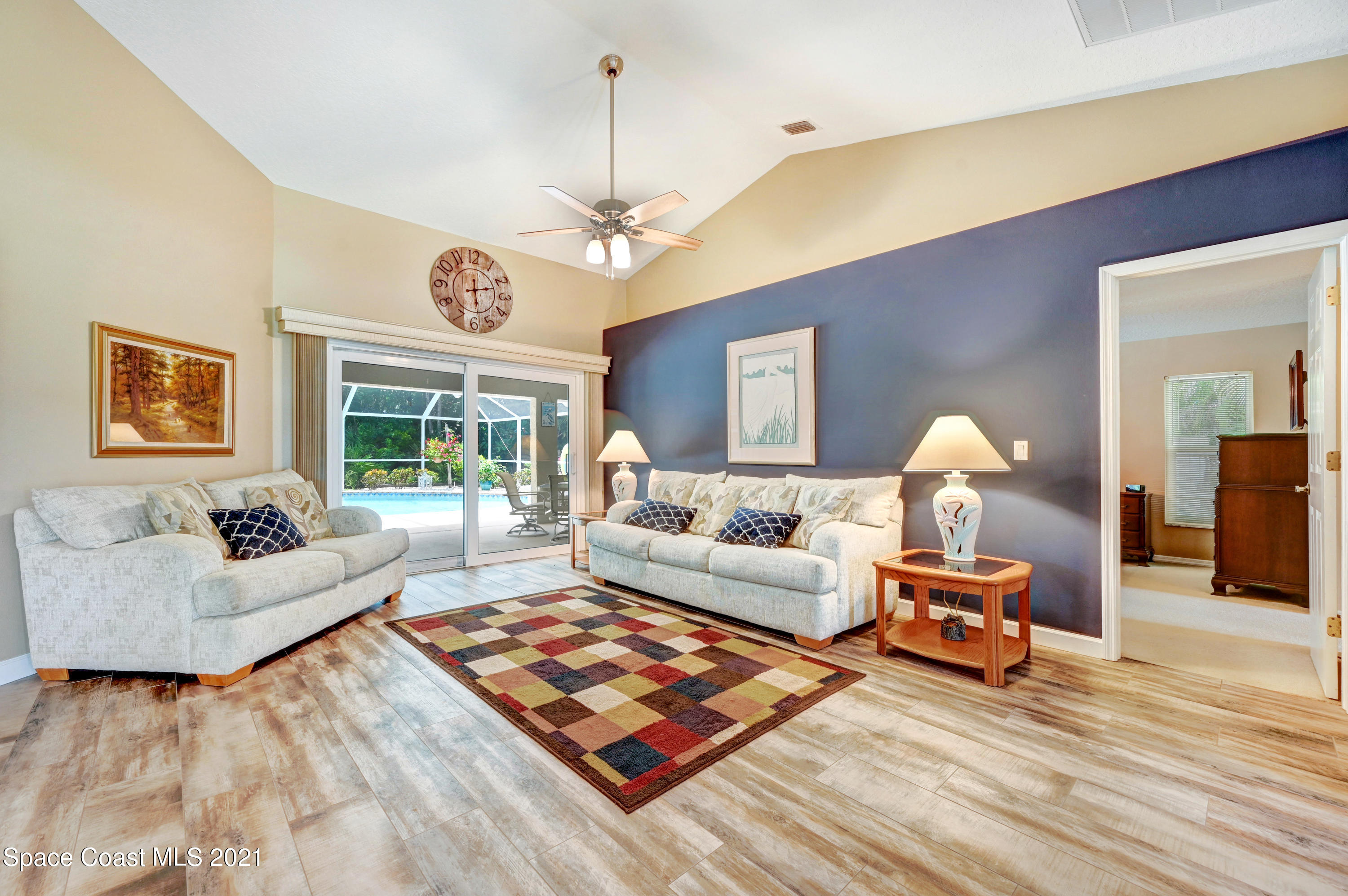 4689 Canard Road Melbourne, FL 32934 - Photo 5 of 49 a living room with furniture rug and window
