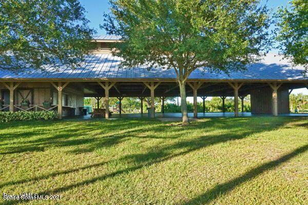 4689 Canard Road Melbourne, FL 32934 - Photo 47 of 49 a view of a house with a backyard