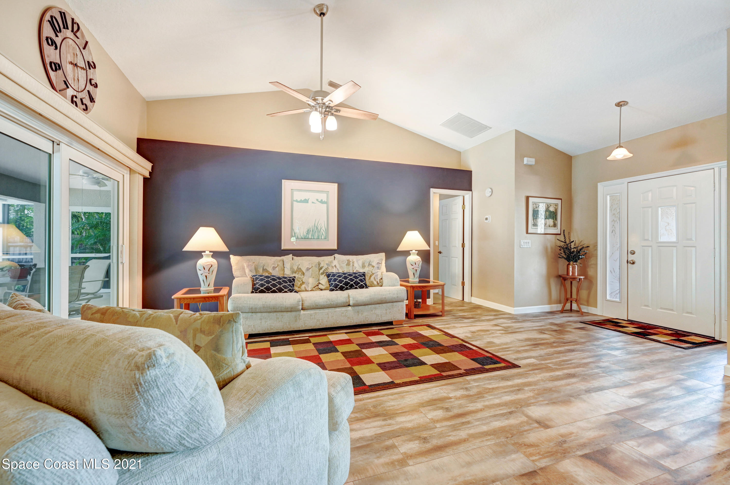 4689 Canard Road Melbourne, FL 32934 - Photo 6 of 49 a bedroom with a bed and window