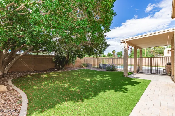 a view of a backyard with a small cabin