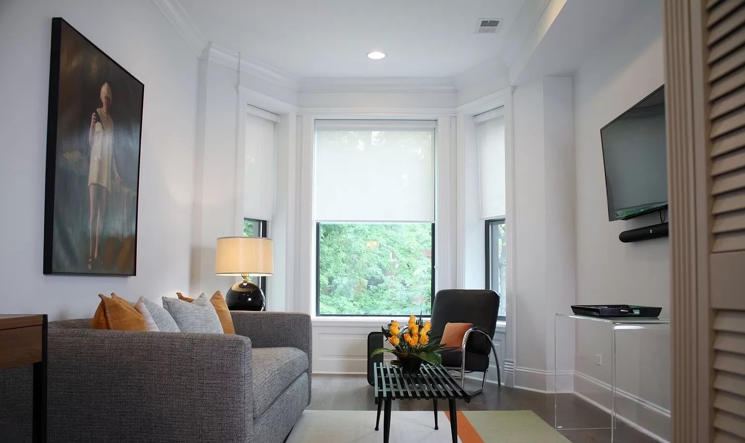 712 West Briar Place Chicago, IL 60657 - Photo 6 of 9 a living room with furniture and a window