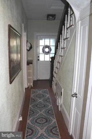 a living room with a couch and a flat screen tv