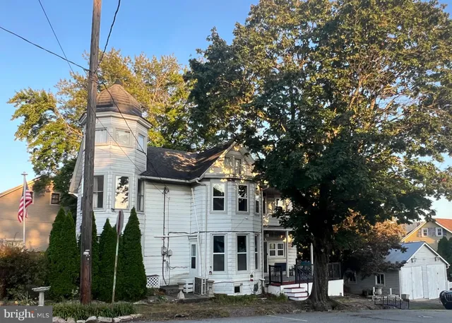 a front view of a building with street view