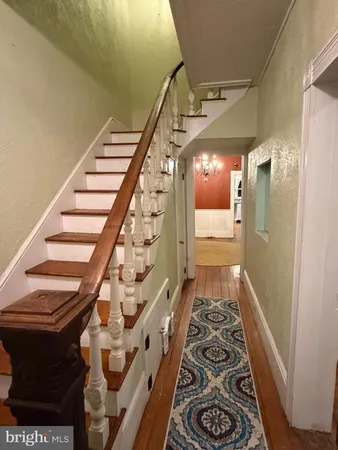 a front view of a house with chairs