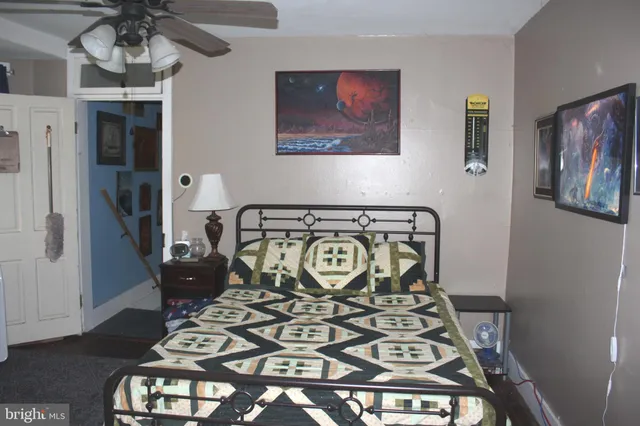 a view of a chairs and table in a backyard