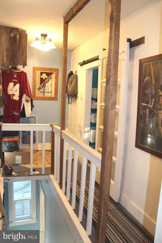 a view of porch with furniture and a yard