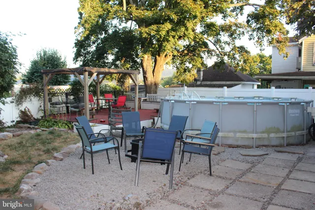 a bedroom with bed and rug