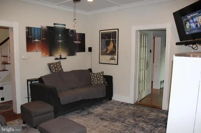a view of a livingroom with wooden floor