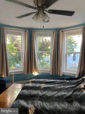 a view of deck with table and chairs with wooden floor and fence