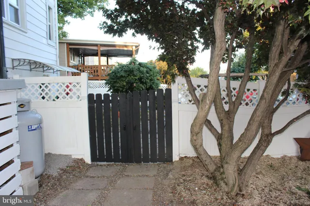 a kitchen with a sink and a stove top oven