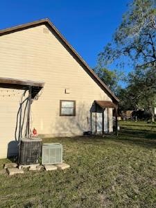 308 Graham Road Kenedy, TX 78119 - Photo 2 of 10 a view of a house with a yard
