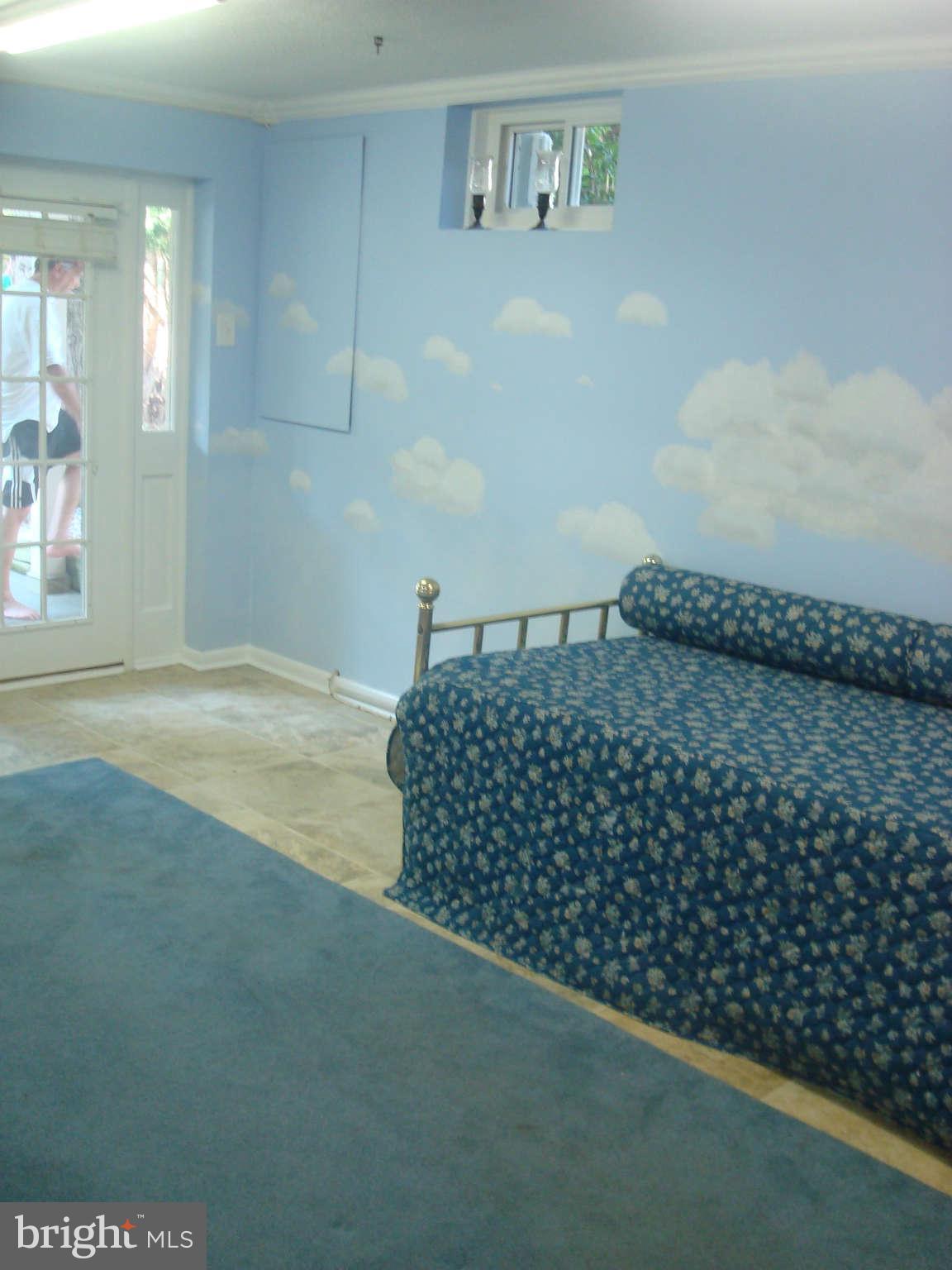 7413 Farnum Street Springfield, VA 22151 - Photo 12 of 17 a bedroom with a bed